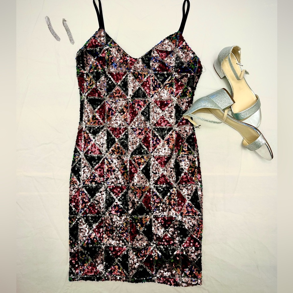 Beautiful Sequin dress! Lots of color and sparkle. Never worn.